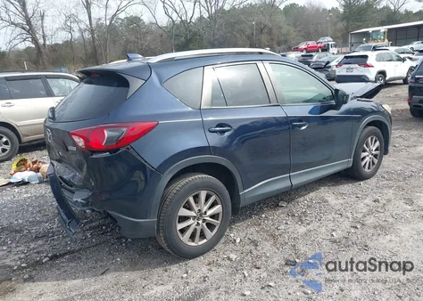 2015 Mazda Cx-5 Touring z USA, uszkodzony, nr VIN JM3KE2CY8F0462054